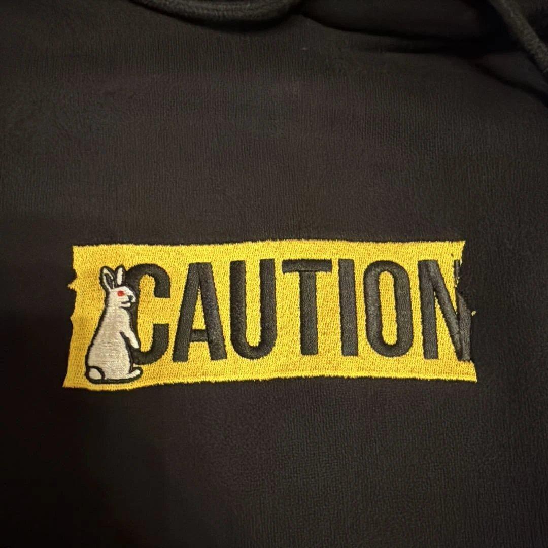 黒 CAUTIONロゴ パーカー #FR2