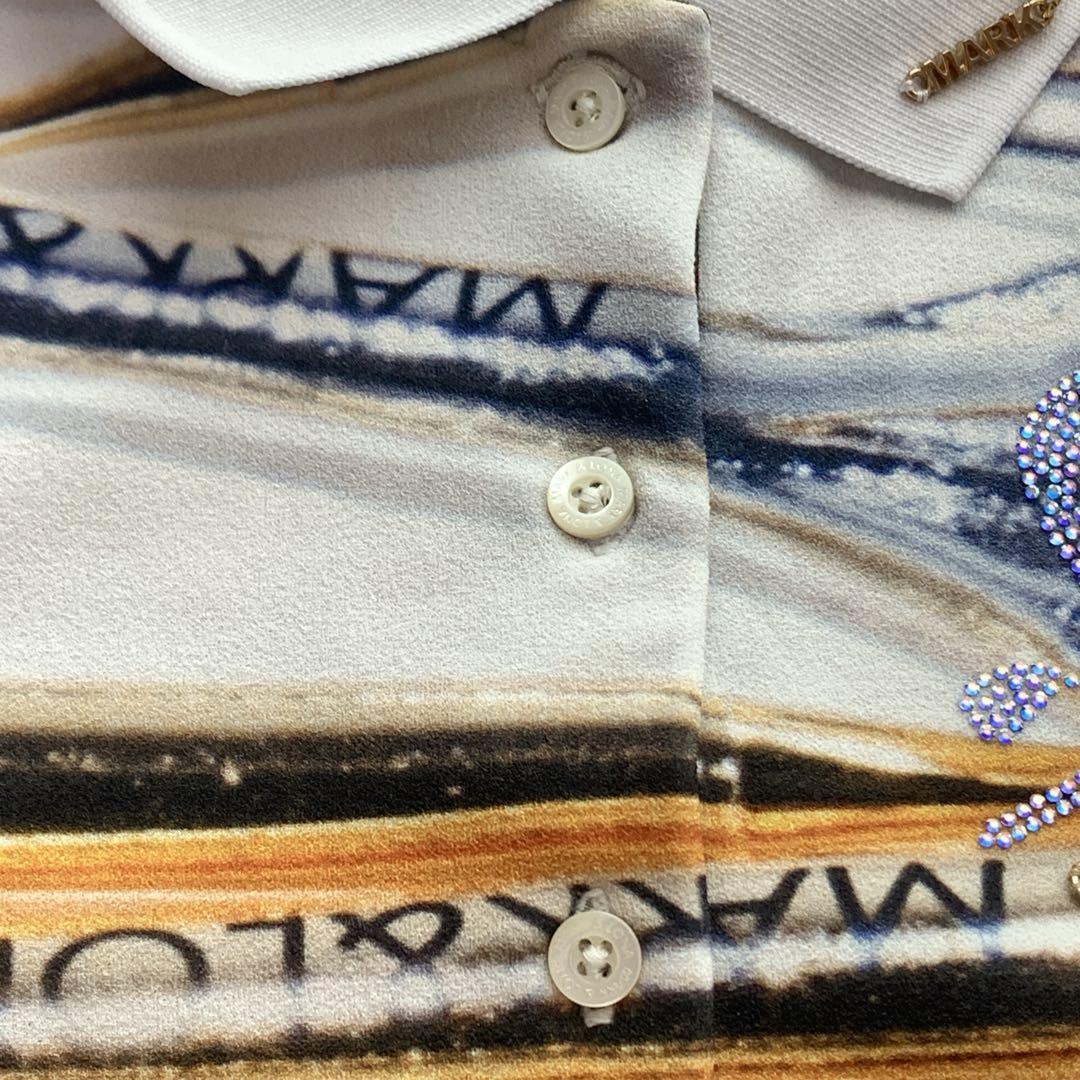 マークアンドロナ ゴルフウェア 総柄 ビジュー スカル2023 スポーツウェア