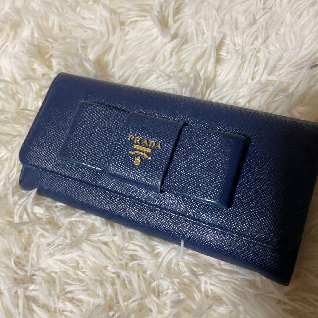 PRADA プラダ サフィアーノ 長財布 二つ折り 青 リボン 人気 フラップ