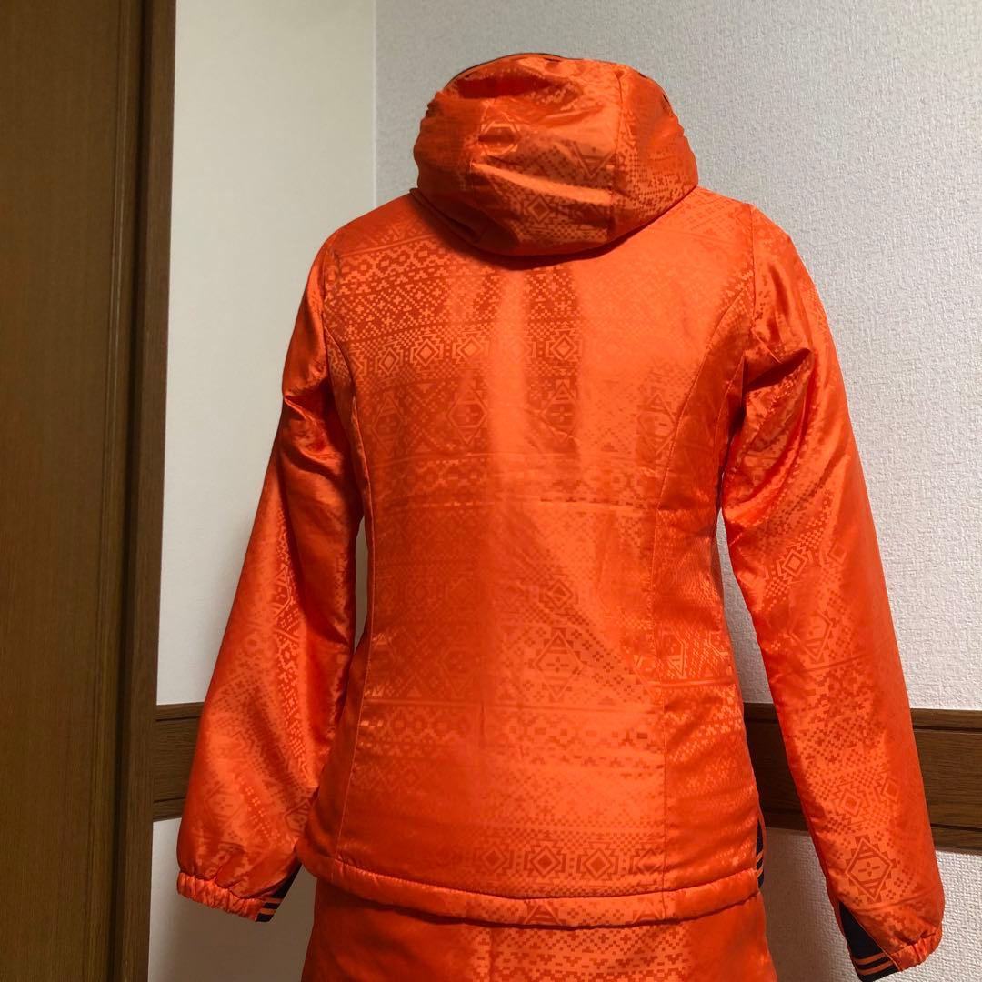 セットアップ マンシングウェア 中綿 パーカー スカート オレンジ 総柄