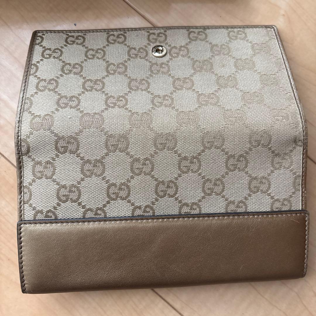 GUCCI ベージュ 長財布 ハート型ロゴ付き