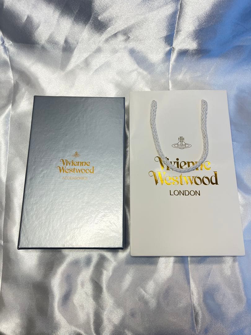 新品 Vivienne Westwood ブルー オレンジ縁 長財布