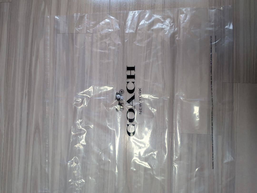 12/14まで特価！新品未使用　COACH　 ブラウン リュックプラ袋布袋付
