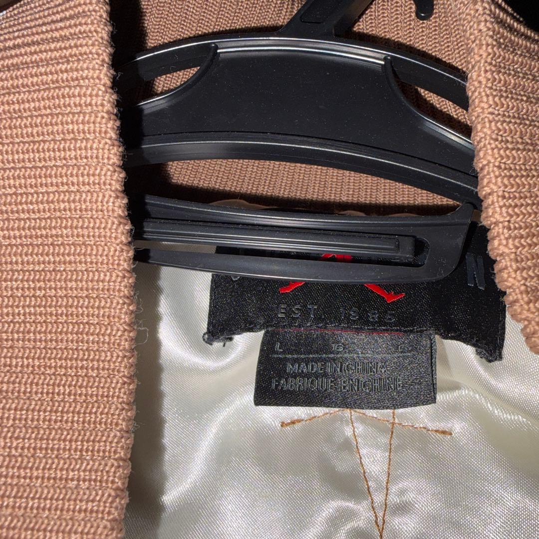 Jordan x Cactus Jack varsity jacket。