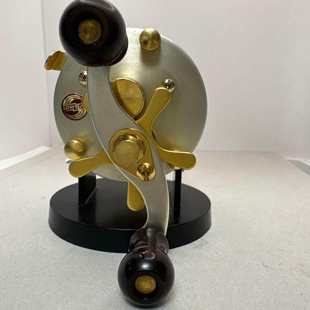 道楽マツモトーイA-20ベイトリール ゴールド/シルバー 収納袋付き