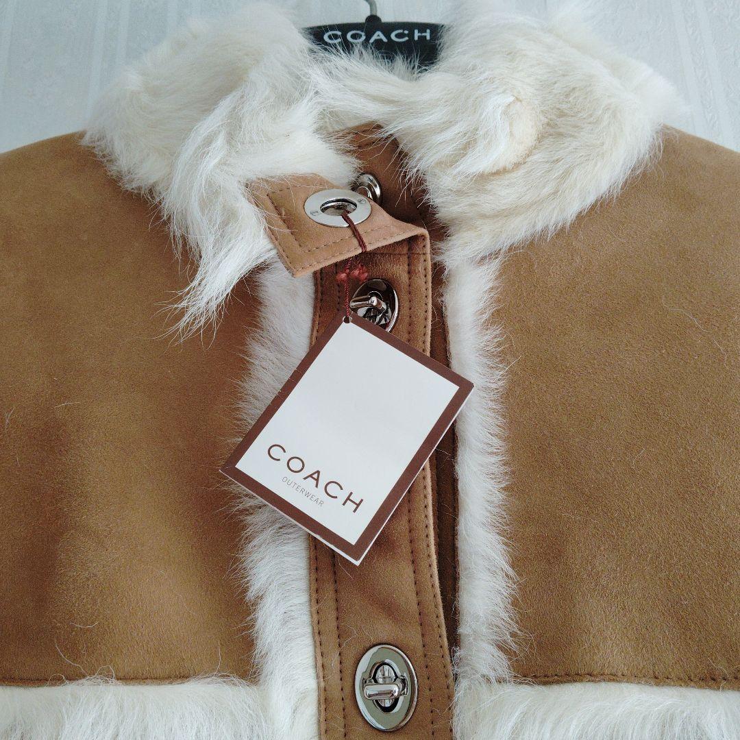 COACH ベージュ ファーケープ ポンチョ 新品タグ付き M - メルカリ