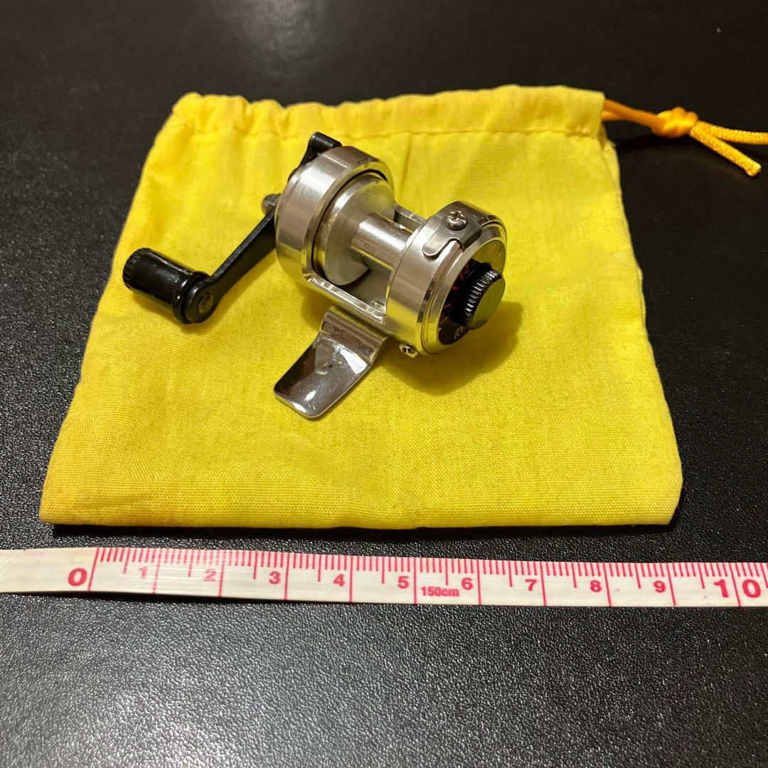 希少】超小型両軸リール RYOBI ULTRA MINI (専用袋付き) - メルカリ