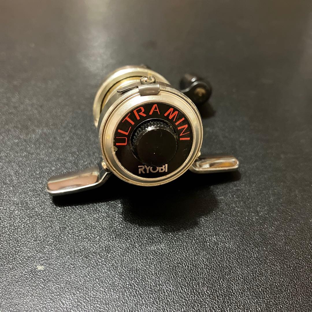 希少】超小型両軸リール RYOBI ULTRA MINI (専用袋付き) - メルカリ