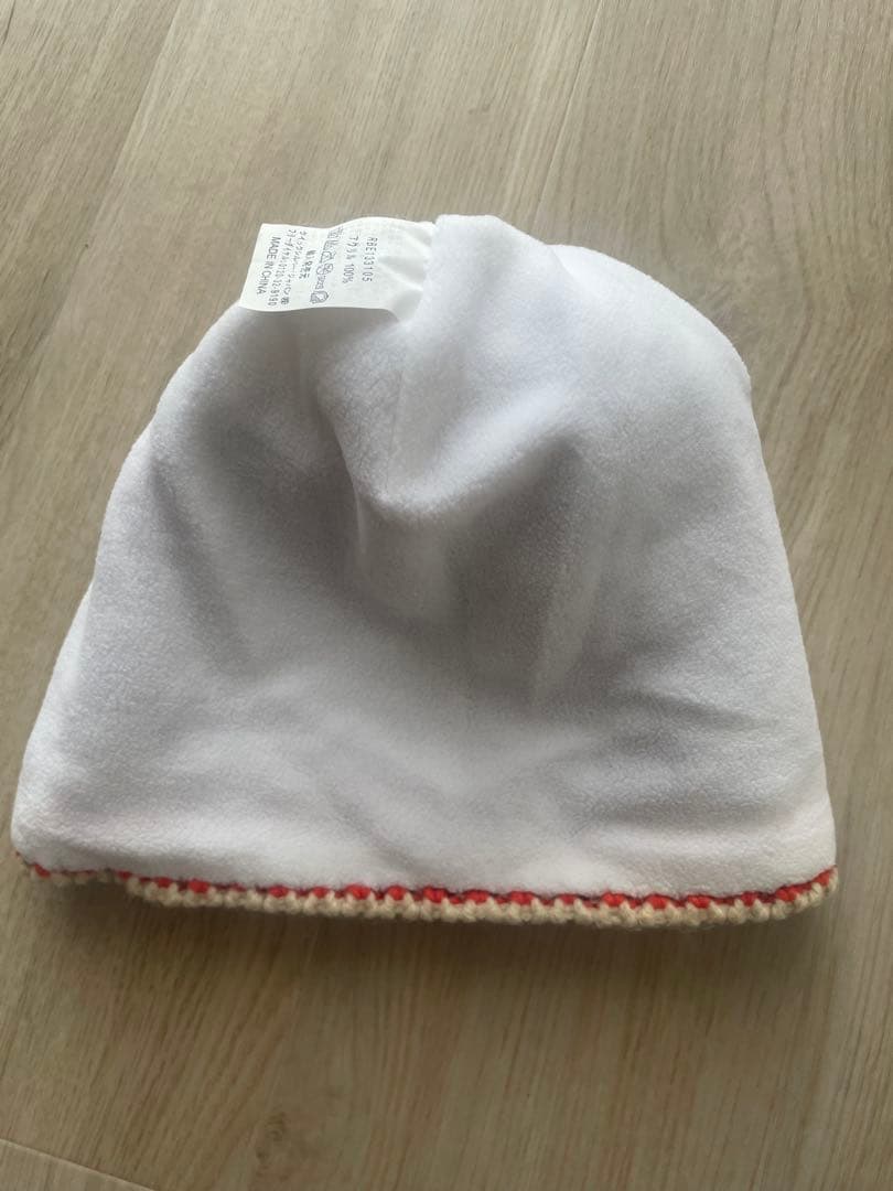 ネイビーのジャケットとオレンジパンツセット