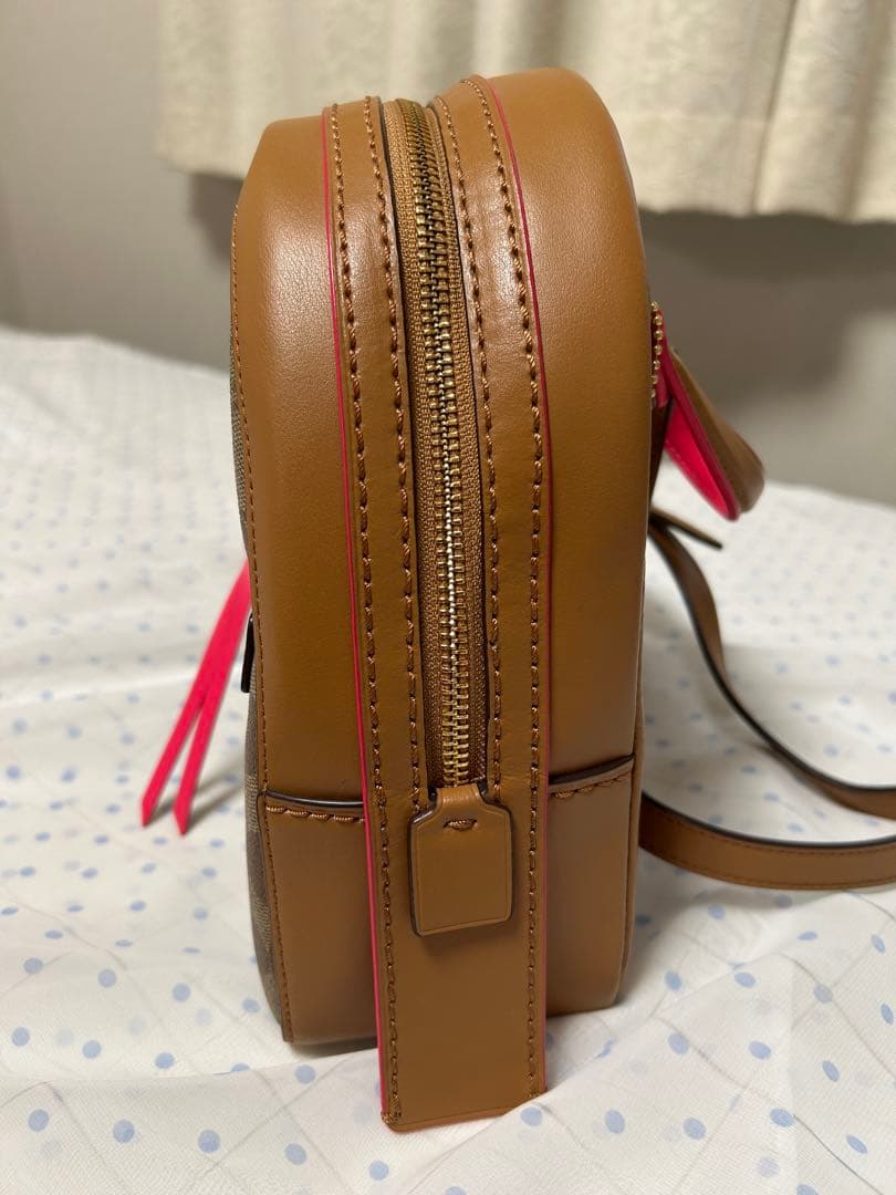 値下げ‼️コーチ リュックサック シグネチャー PVC×レザー ブラウン×ピンク