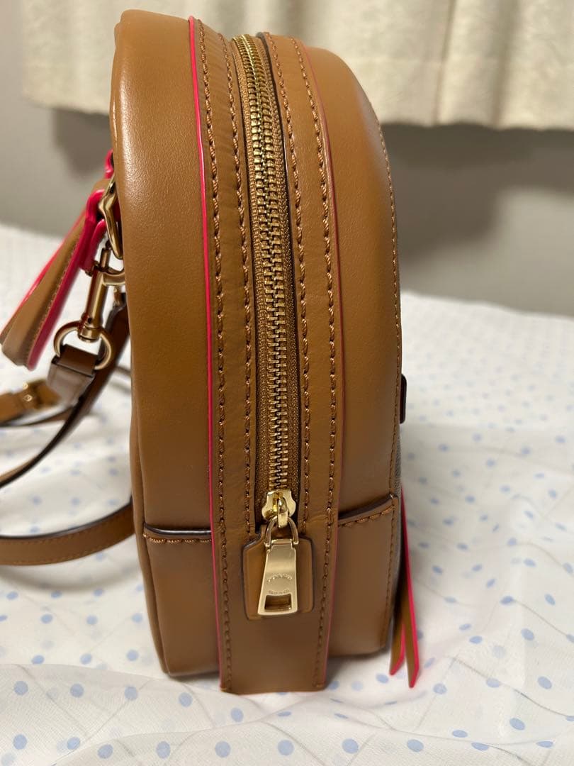 値下げ‼️コーチ リュックサック シグネチャー PVC×レザー ブラウン×ピンク