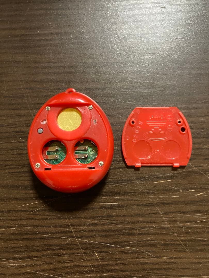 【動作確認済・ジャンク】サンタクロっちのたまごっち　レッド　※裏蓋両側ビス欠け