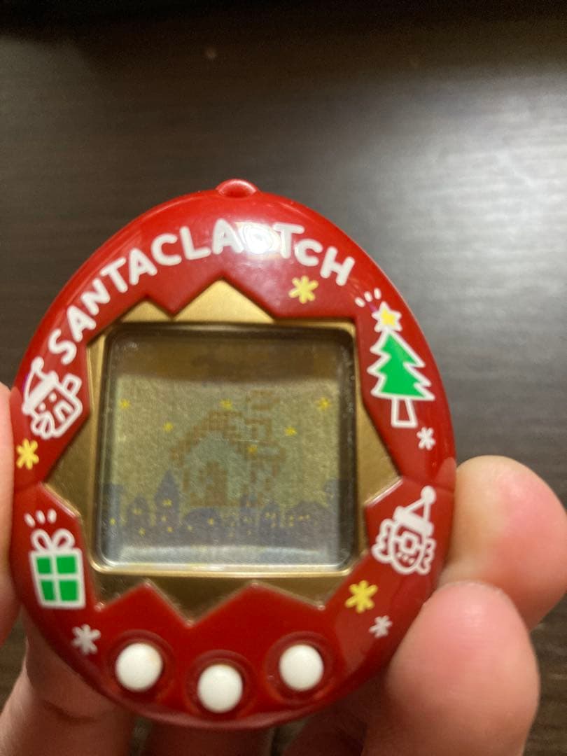 【動作確認済・ジャンク】サンタクロっちのたまごっち　レッド　※裏蓋両側ビス欠け