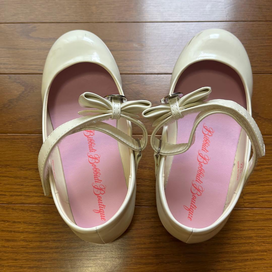 TDRビビディ・バビディ・ブティックのベルの黄色ドレス着丈_サイズ130