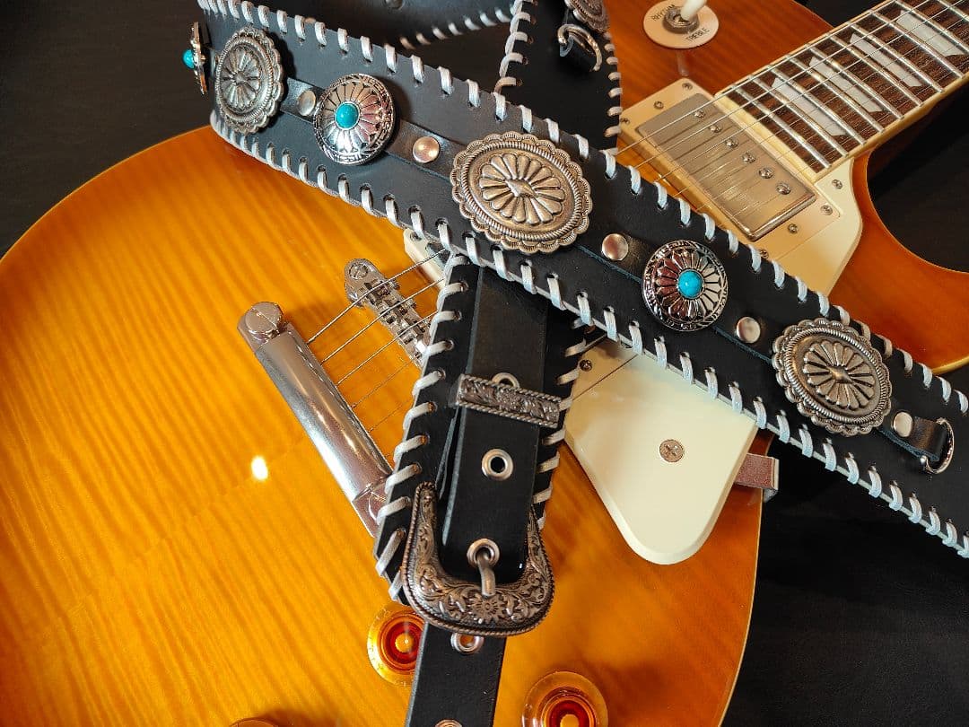 ギターストラップ 本革3mm厚 ターコイズ風コンチョ 117〜130cm - メルカリ