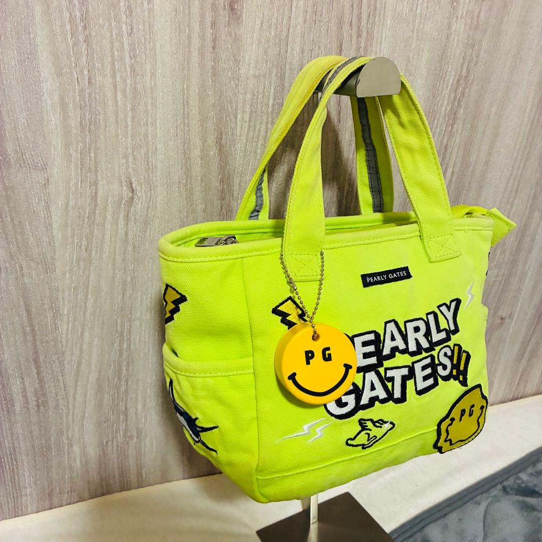 パーリーゲイツ　ニコちゃん　総柄　アート　刺繍　PG カートバッグ　ロゴプレート