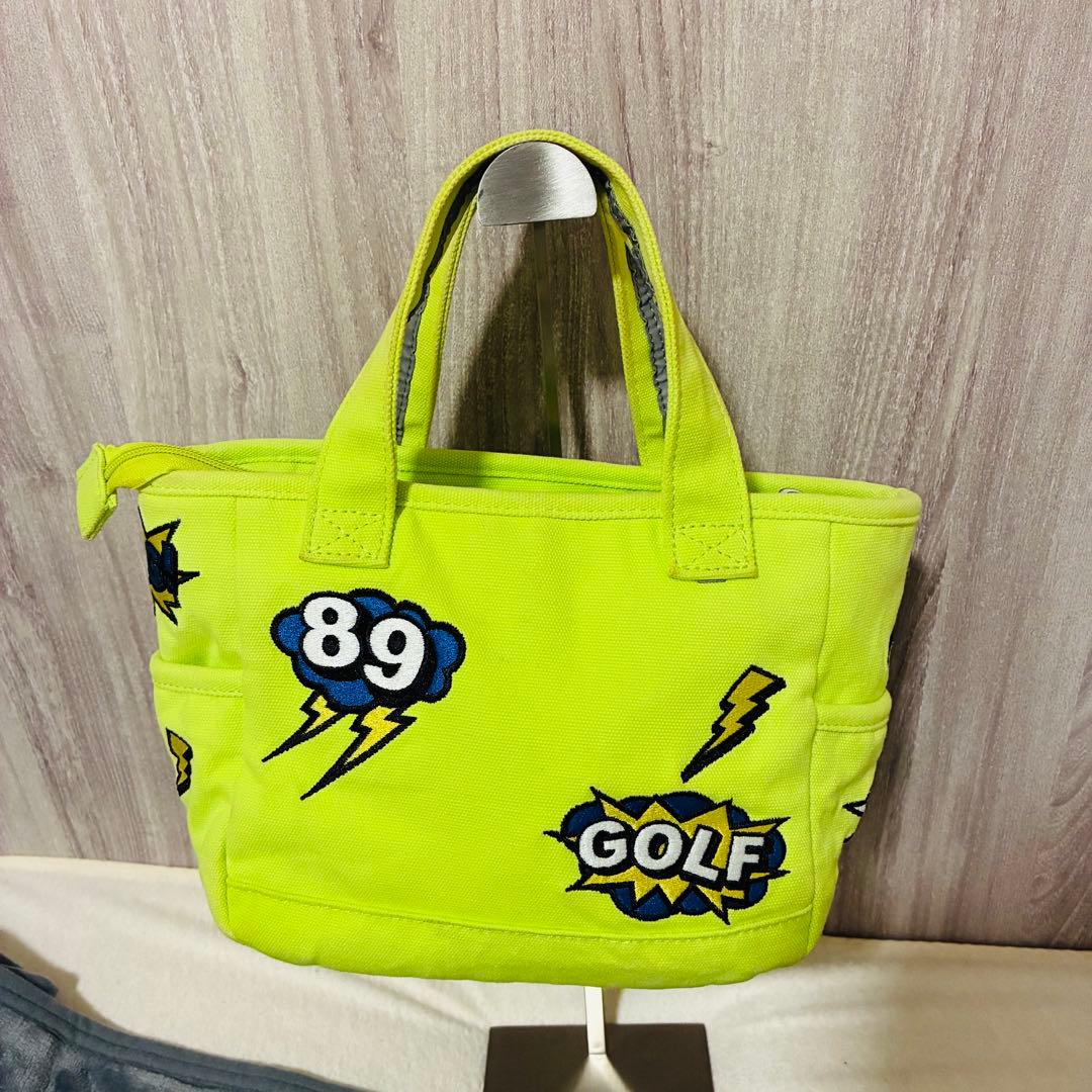 パーリーゲイツ　ニコちゃん　総柄　アート　刺繍　PG カートバッグ　ロゴプレート