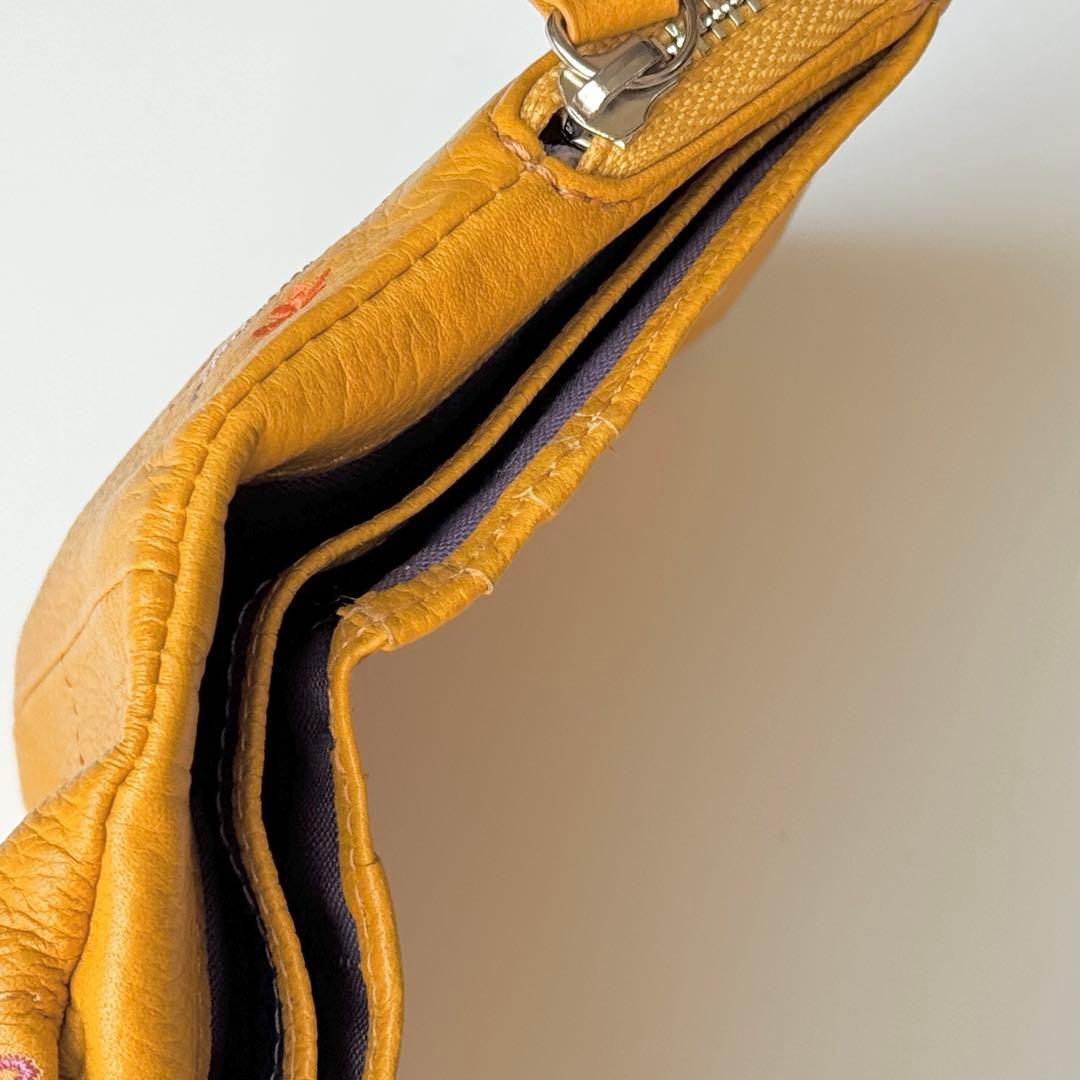 Joocomomola ホコモモラ 刺繍入り二つ折り財布 がま口 小銭入れ