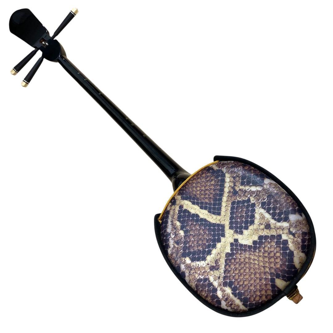 ✨付属品多数✨ 沖縄 三線 特上 人工皮革 蛇柄 ソフトケースや替弦など付属！