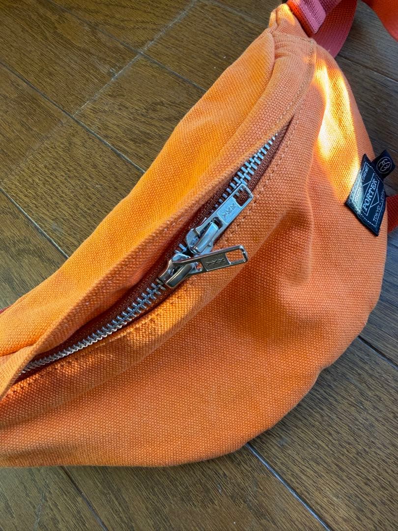 ポータステューシー コラボ ボディバッグ 三日月型 オレンジ