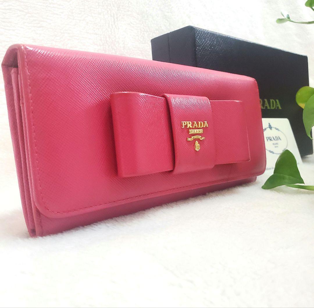 極美品 プラダ 長財布 サフィアーノ フィオッコ ブルー メタルロゴ リボン