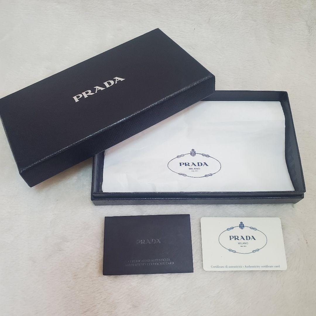 極美品 プラダ 長財布 サフィアーノ フィオッコ ブルー メタルロゴ リボン