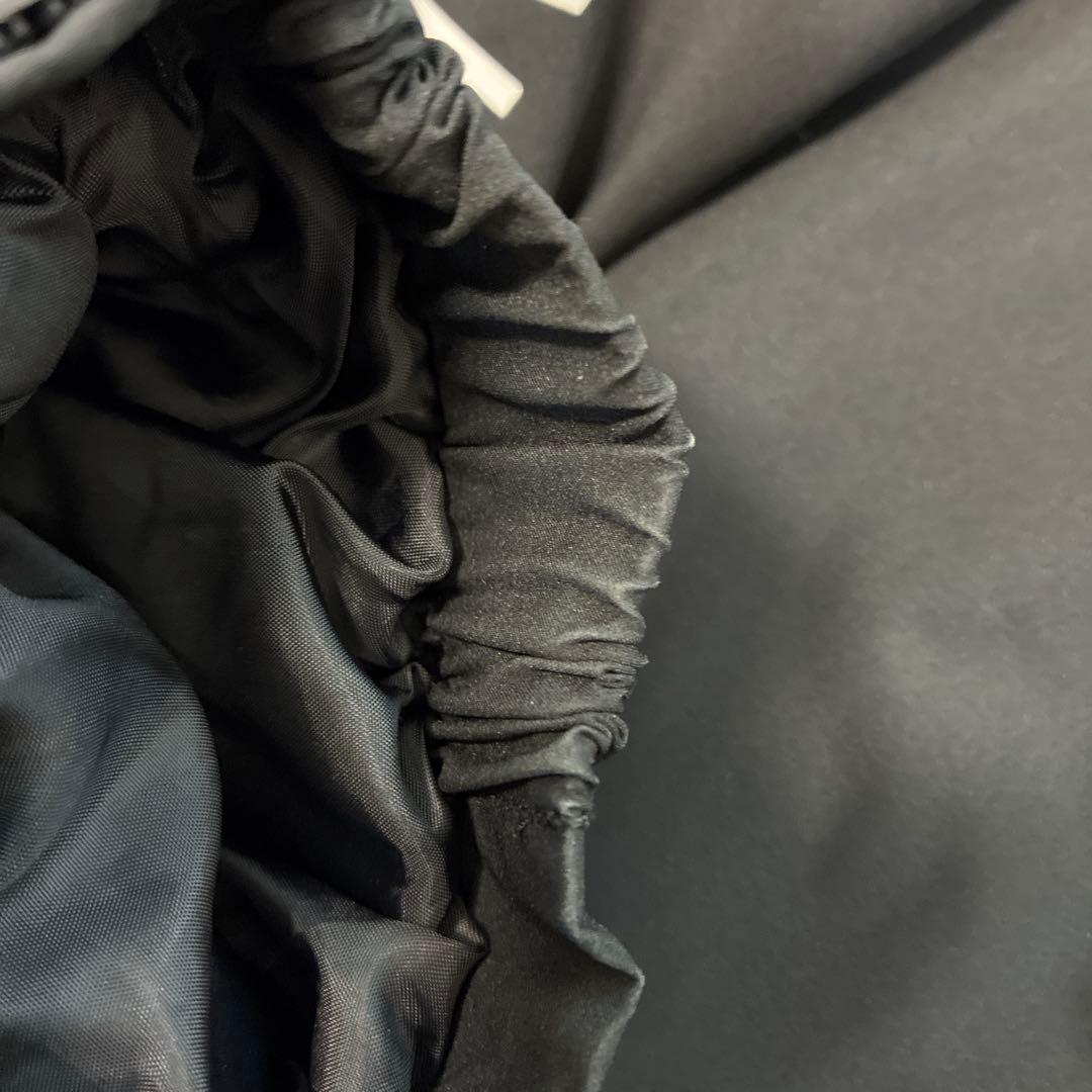 svolme発熱中綿ウォーマー上のみブラックLサイズ