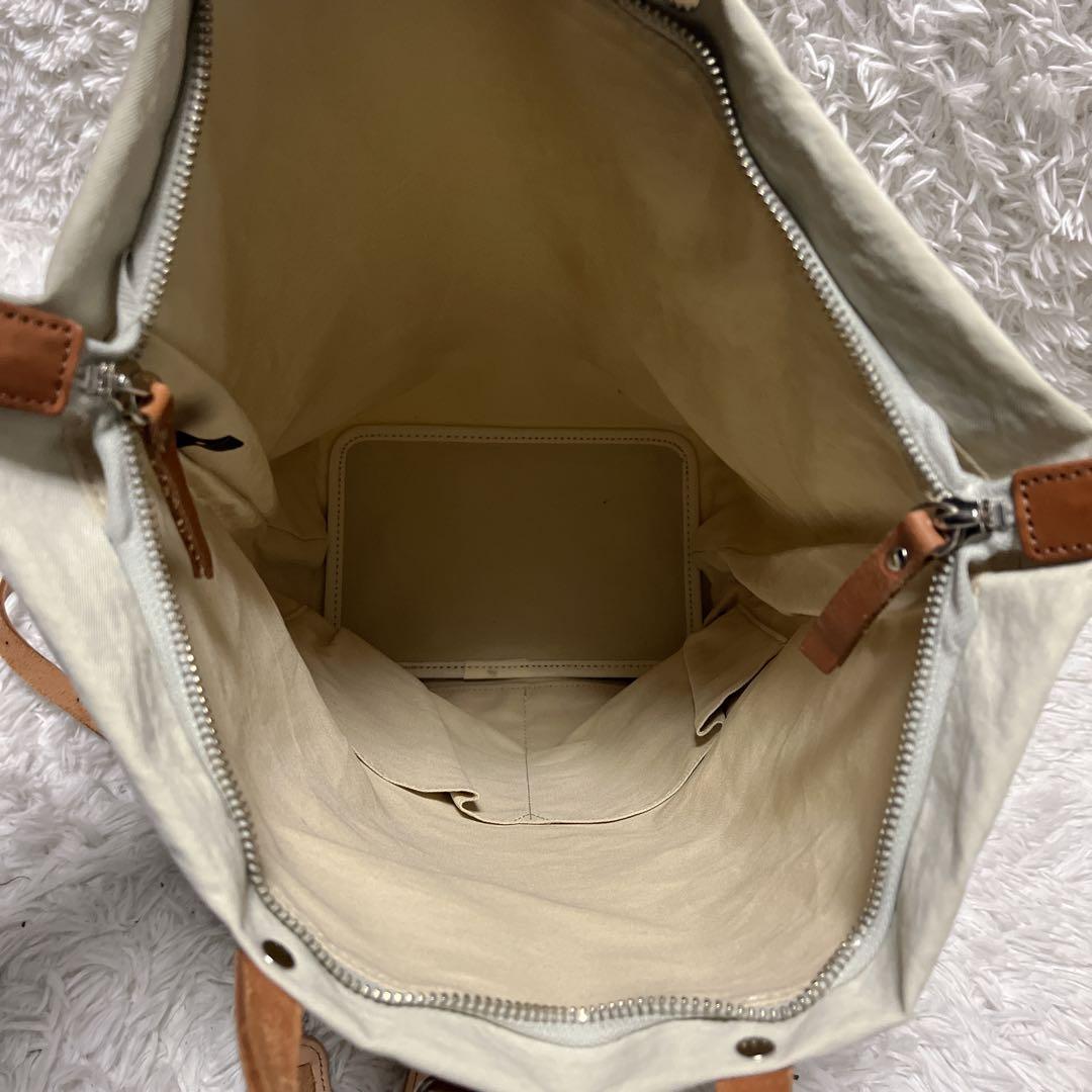 【美品】豊岡鞄 TUTUMU ツツム books リュック キナリ