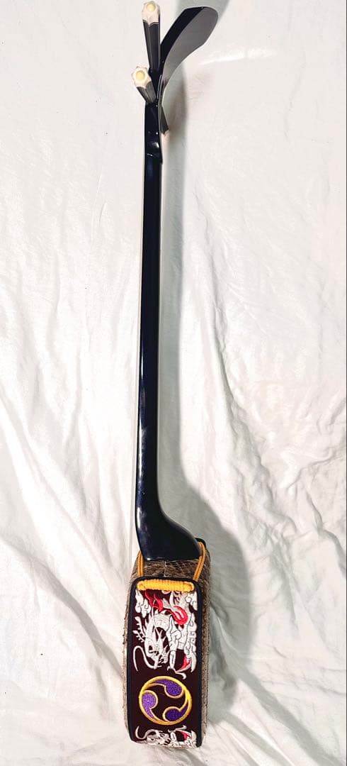 沖縄三線（おきなわさんしん）蛇皮本皮強化張り　替弦、専用ソフトケース付き