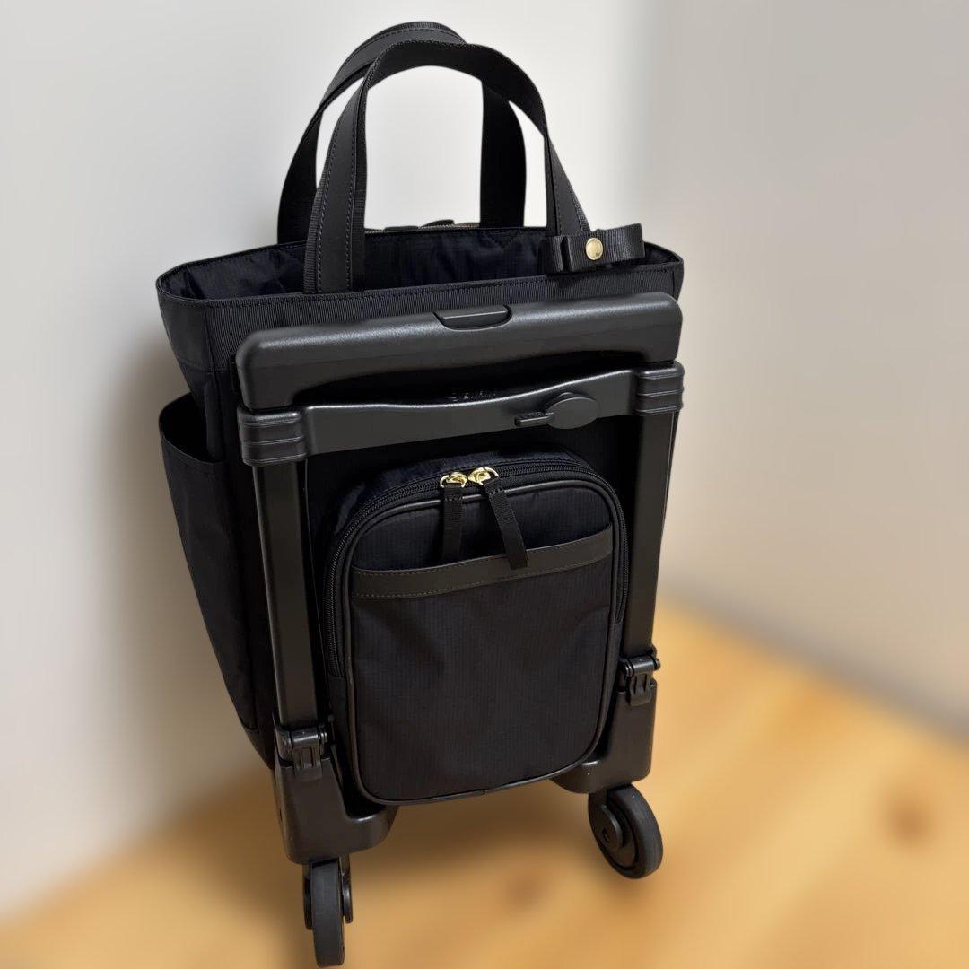 値下げ‼️人気ブランド‼️SWANY‼️スワニー4輪キャリーバック（レインカバー付き）