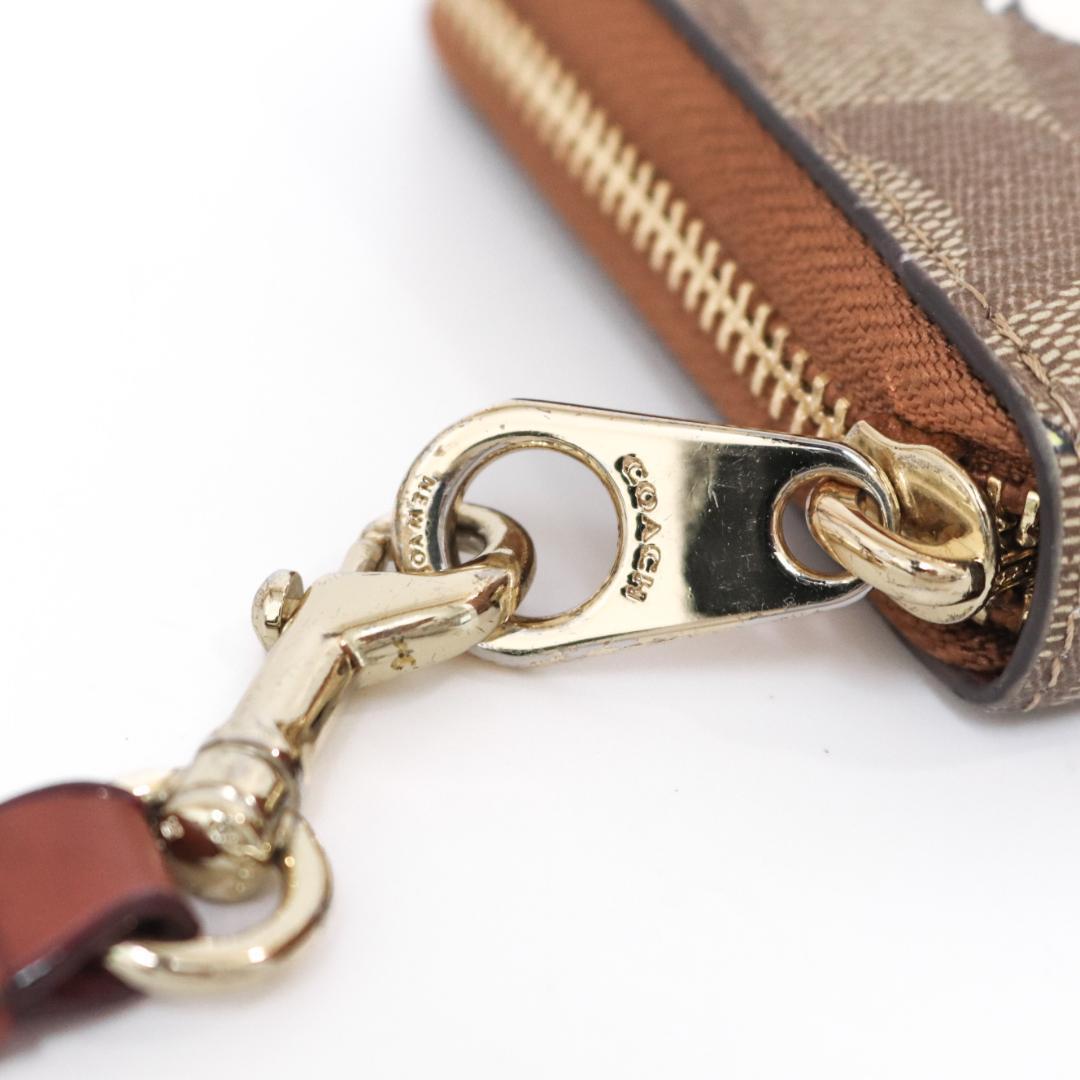 COACH ×PEANUTS　スヌーピー 長財布　シグネチャー　カーキマルチ