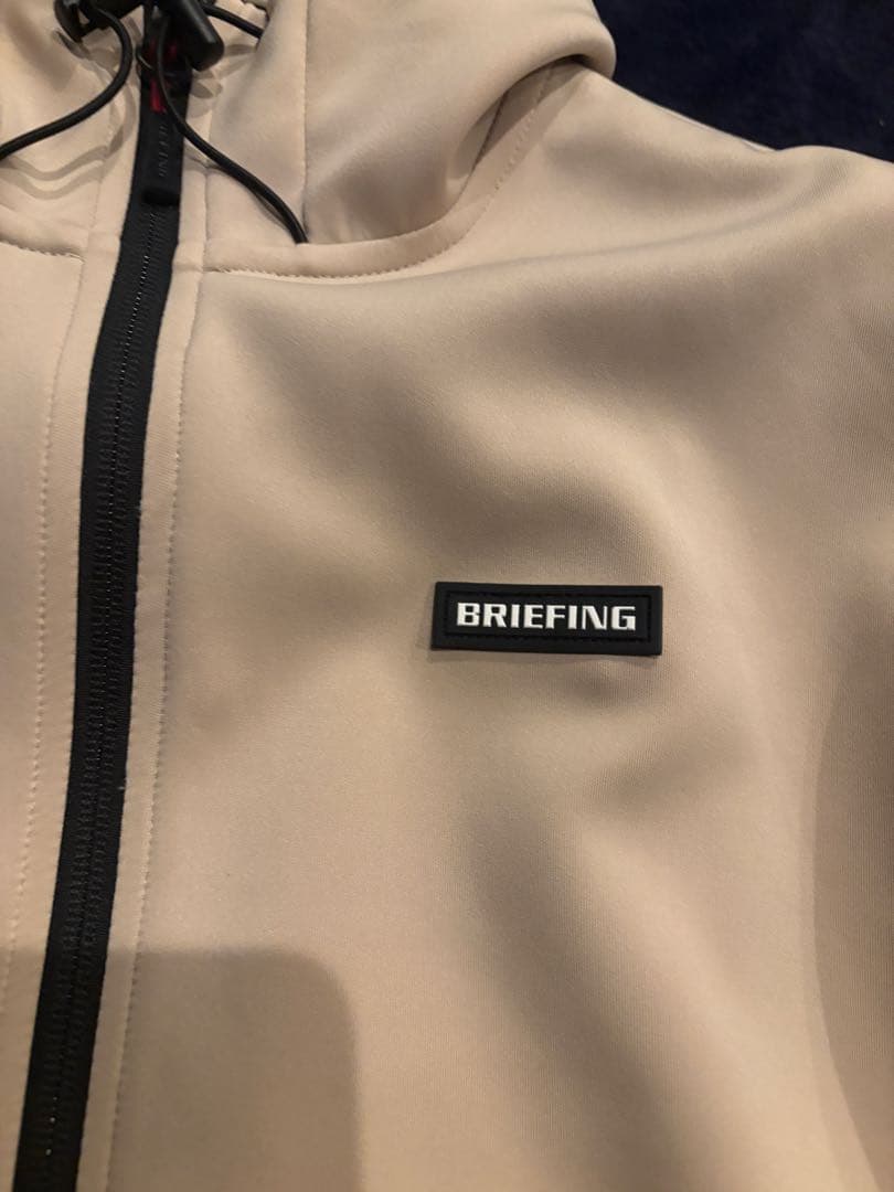 BRIEFING フード付きベージュパーカー