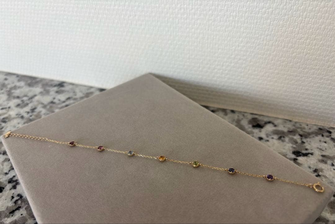 TSUTSUMI K10イエローゴールド マルチストーンブレスレット