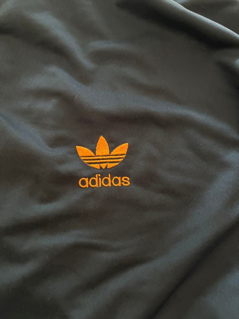 adidas トラックジャケット ネイビー/オレンジ