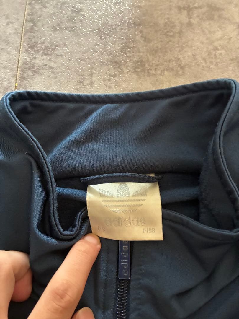 adidas トラックジャケット ネイビー/オレンジ