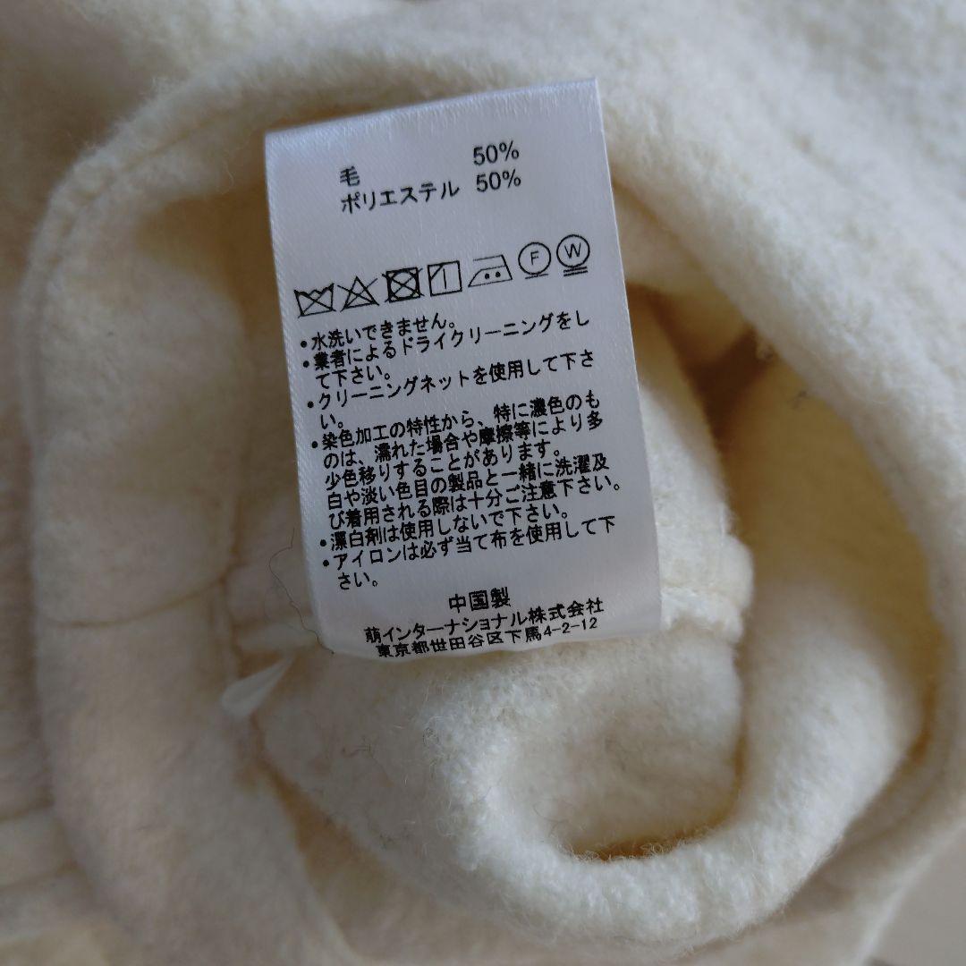 センソユニコ モユル ホワイト ボタン付き ハイネック ポン