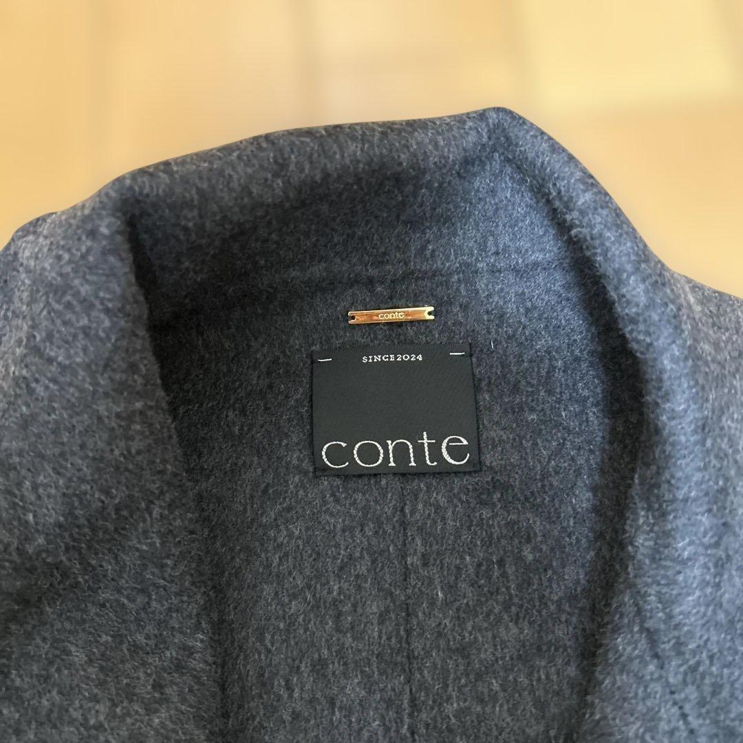 新品タグ付 conte コンテ リバーストールコート - メルカリ