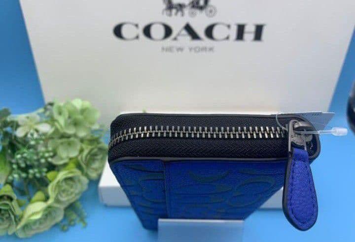 新品未使用コーチ長財布シグネチャーロングジップブルーレディースメンズ送料無料