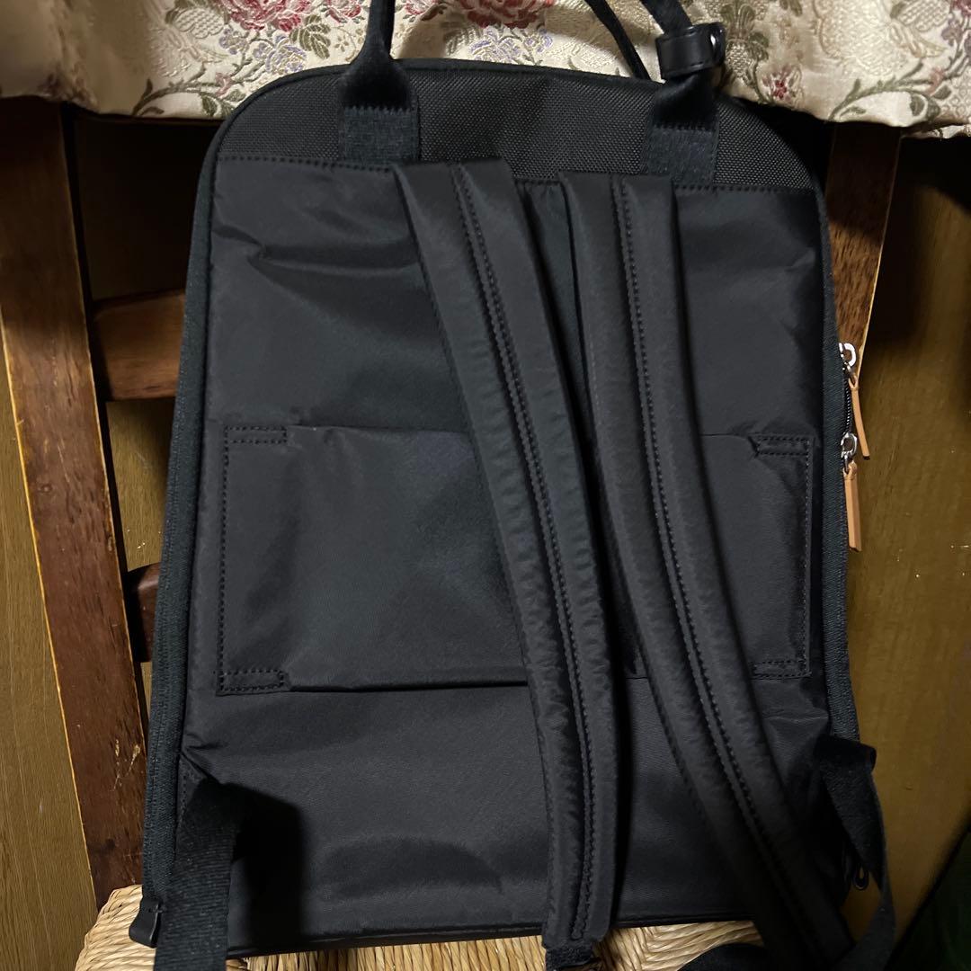 TUMI Voyageur エッセンシャル ブラック リュックバックパック保証証