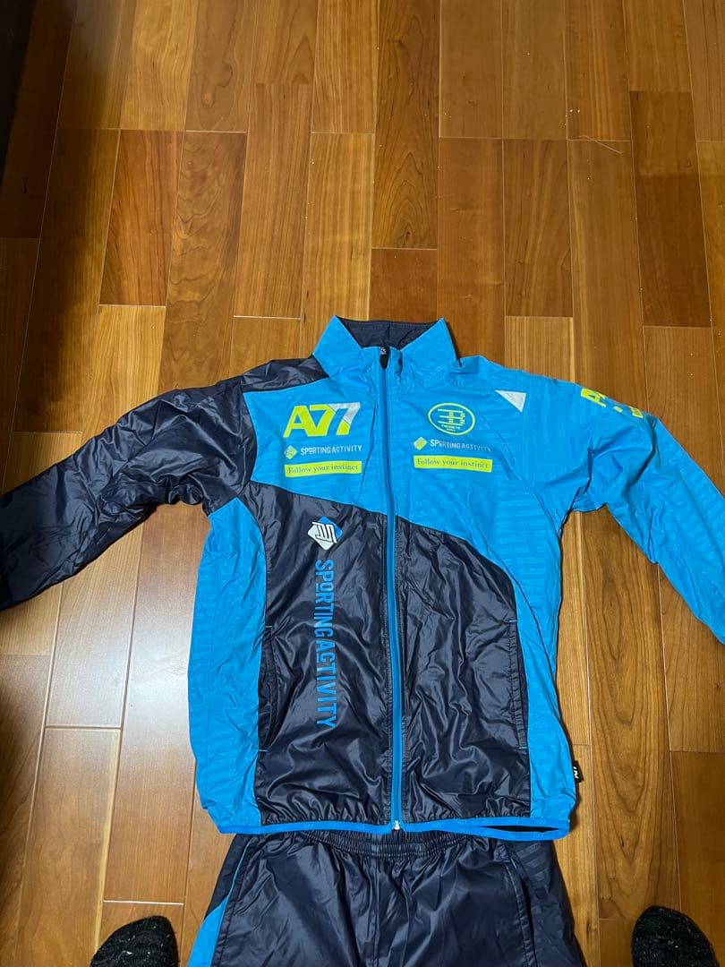 ASICS ウィンドブレーカー 青/黒