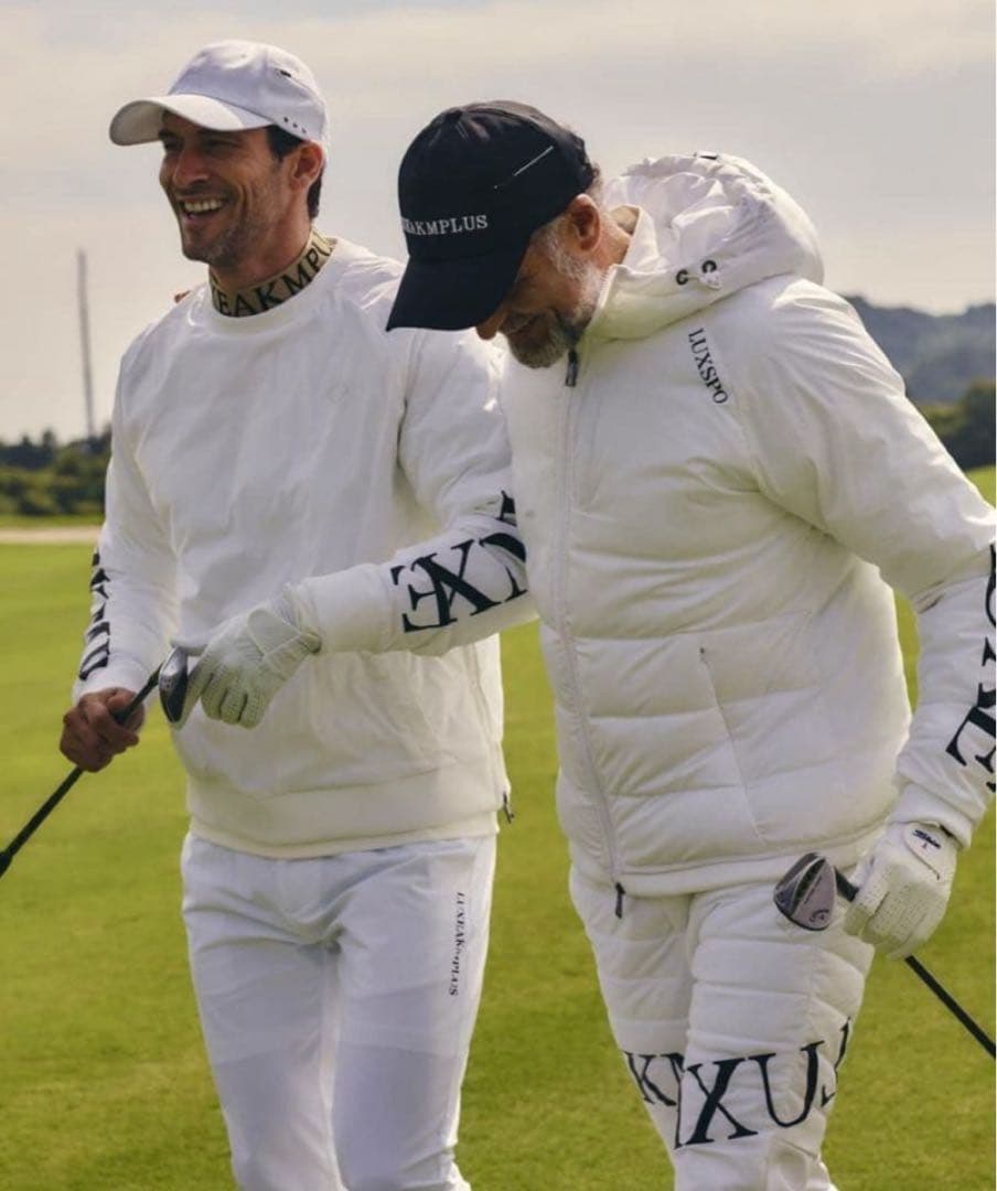 リュクスエイケイエムプラス ゴルフ 防風 サークルロゴウィンドウパンツ＆ウェア