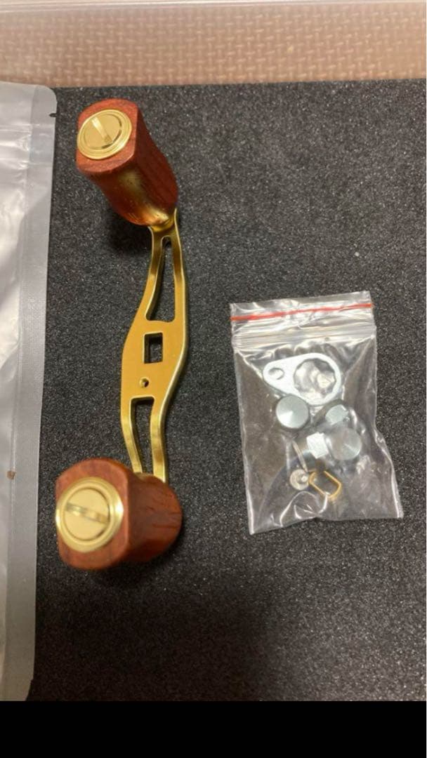 ダイワ　ミリオネア　gs-2000C 新品ウッドハンドルノブカスタム