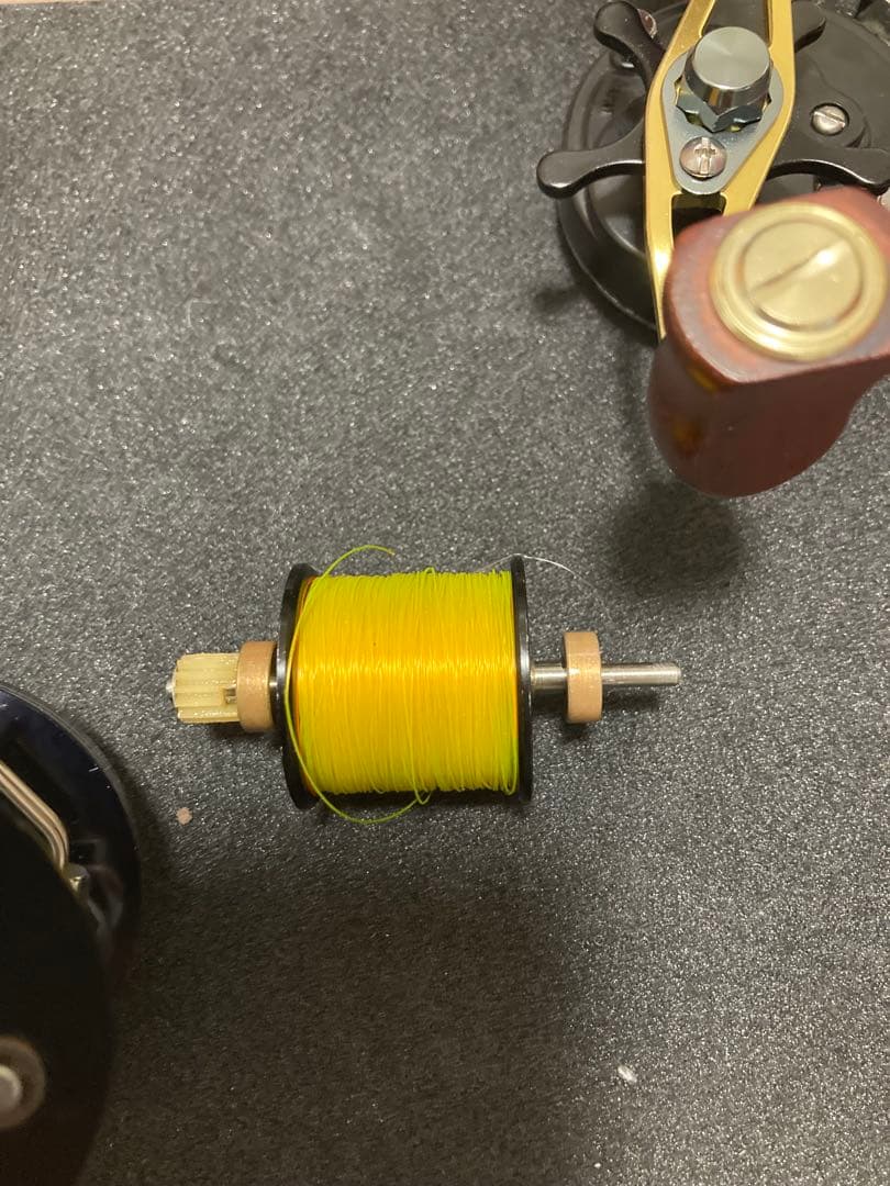 ダイワ　ミリオネア　gs-2000C 新品ウッドハンドルノブカスタム