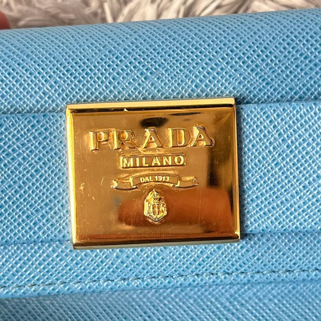 美品✨PRADA キーケース6連　ゴールドロゴ　サフィアーノ　水色