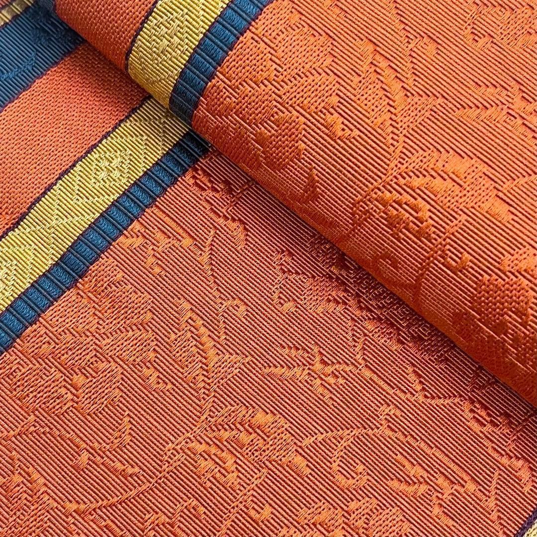 半幅帯 本場筑前博多織 縦縞に花唐草模様 赤橙色 D-2011 - メルカリ