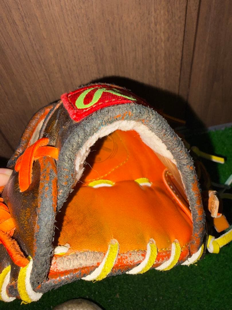 Rawlings 軟式ファーストミット黒/オレンジ