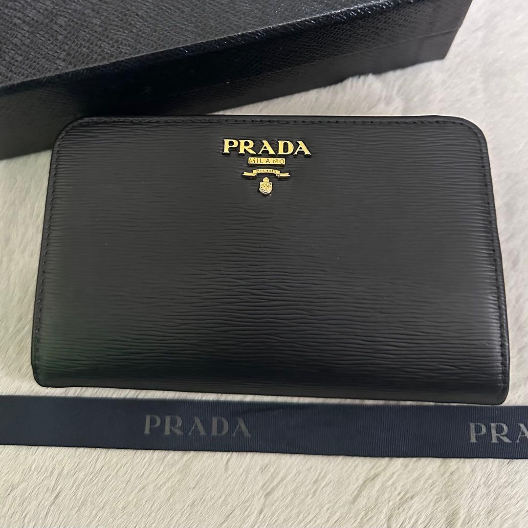 PRADA プラダ 折り財布 ネイビー ラウンドファスナー ゴールドロゴ