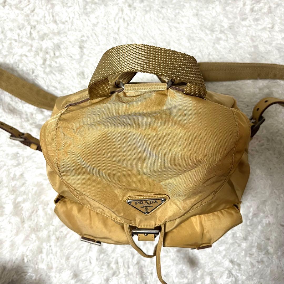✨入手困難✨希少カラー PRADA リュック 三角ロゴプレート ベージュ 巾着型