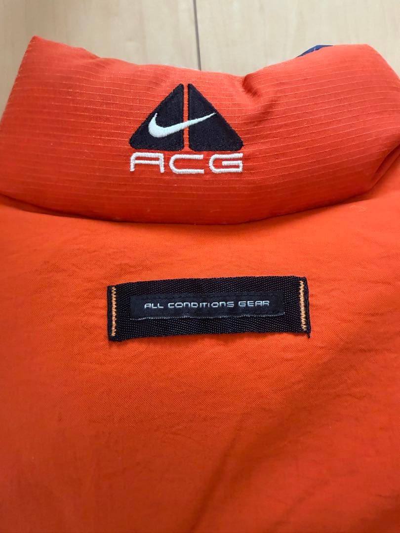 Nike ACG オレンジ ダウンベスト