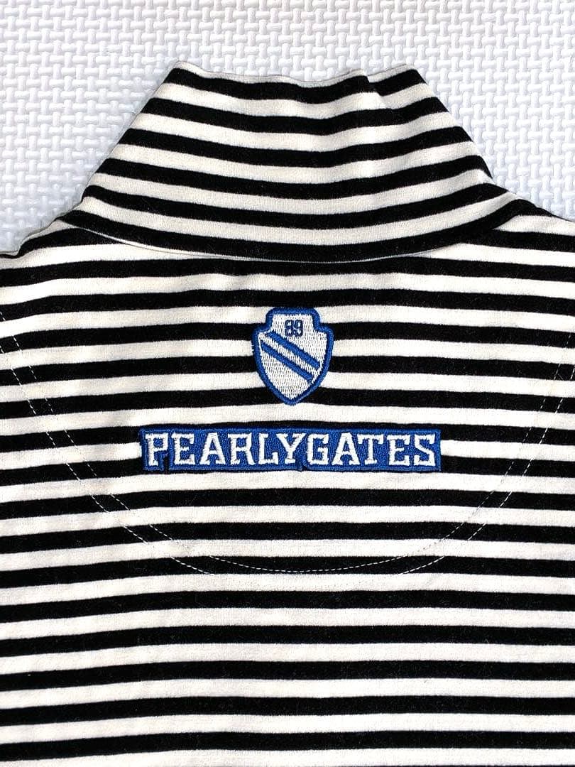 パーリーゲイツ プレミアウォームハーフジップ モックネック（NAV×WHT